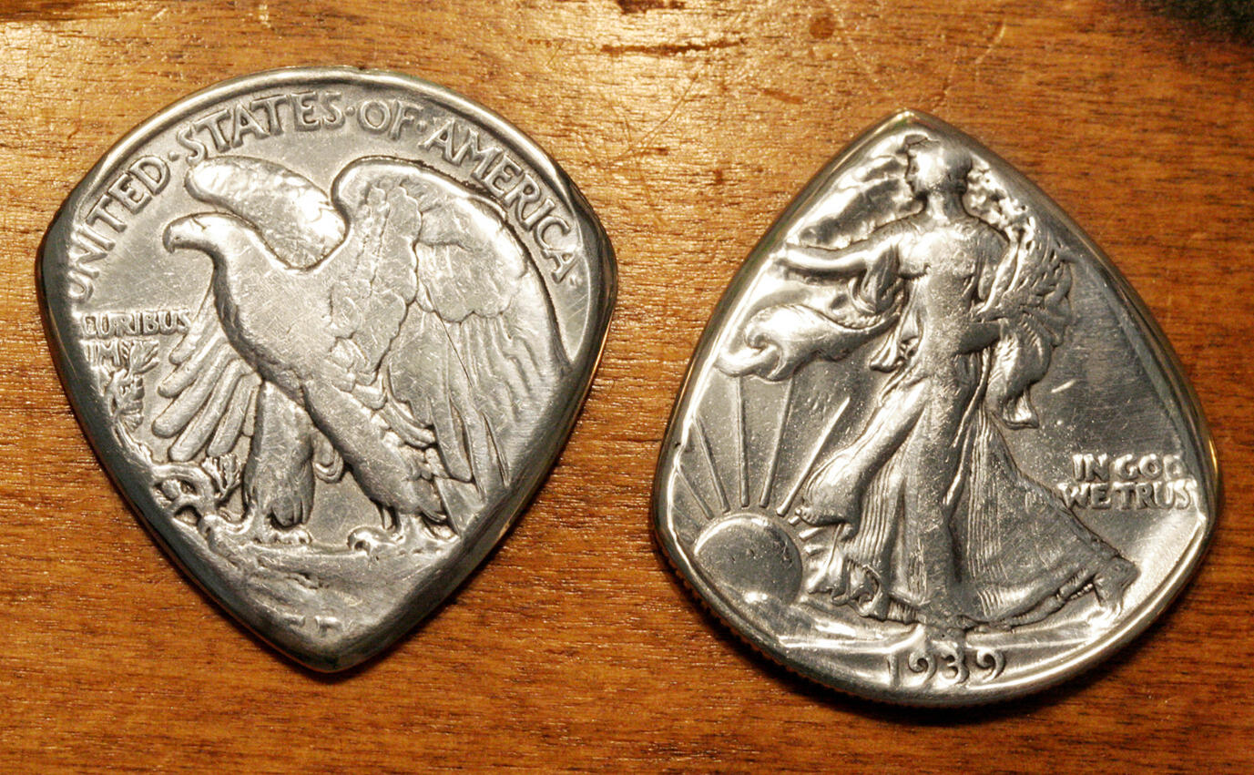 silver coin guitar pick